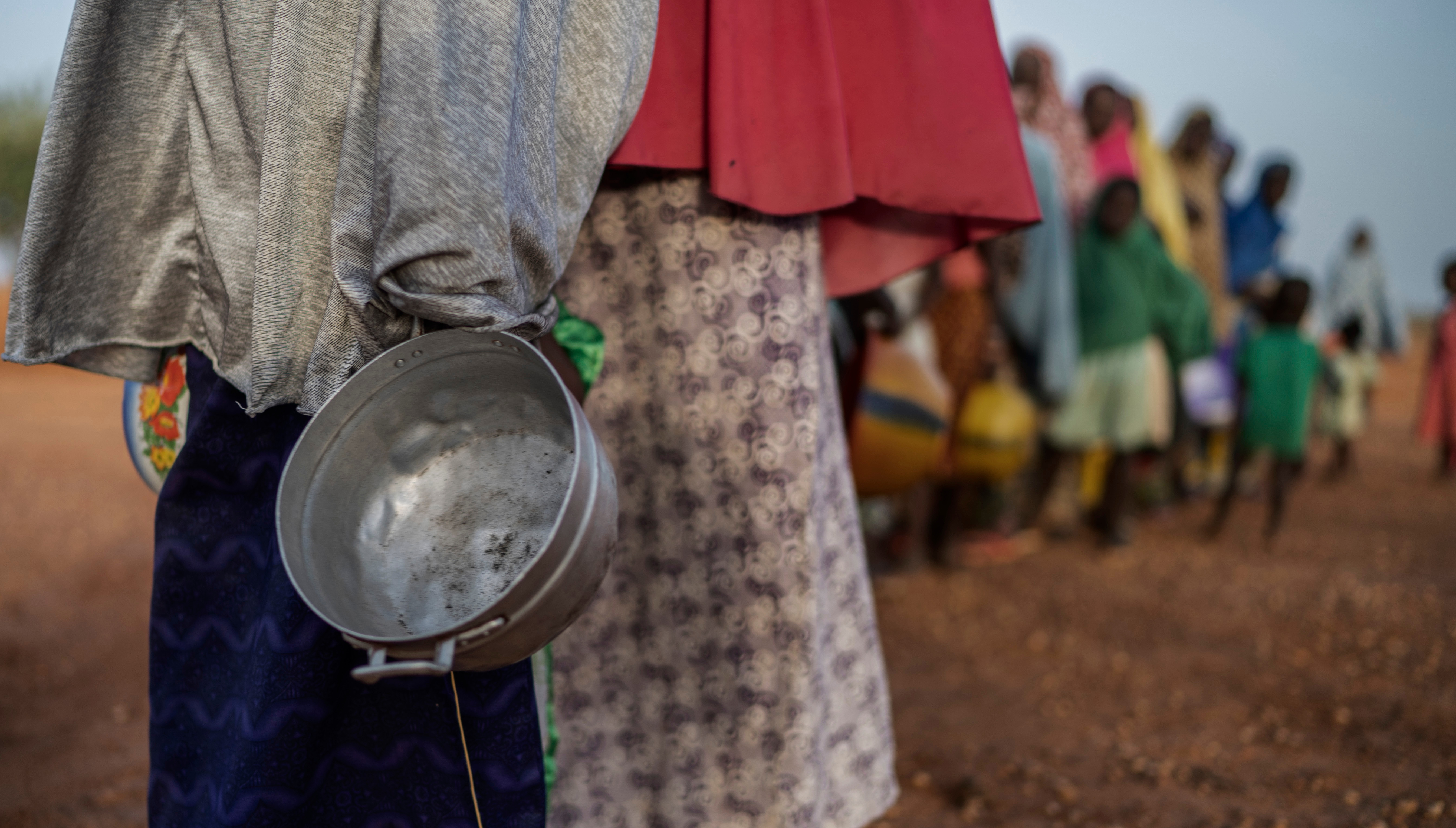 There's not enough for everyone. Empty food bowls in areas in a country in crisis. 