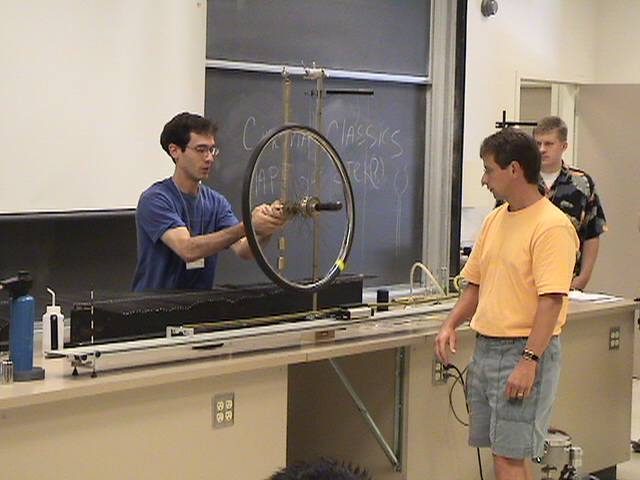 3A40.10 Circular motion vs. mass on spring - Jason St. John and Sam Sampere